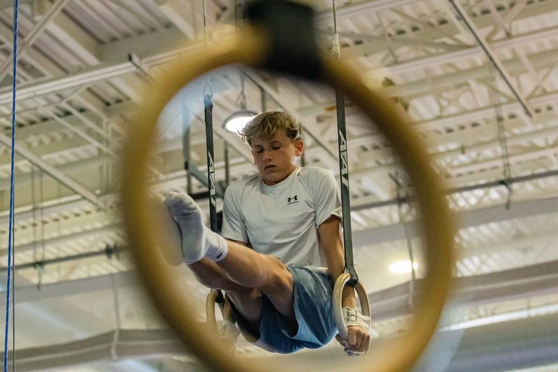 Arlington Tigers gymnast training on rings at Barcroft Sports and Fitness Center