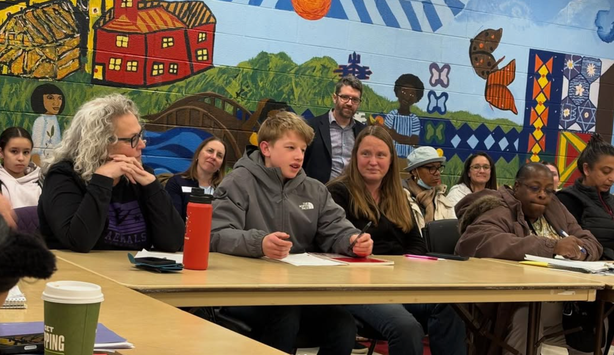 Tigers gymnast speaking at meeting