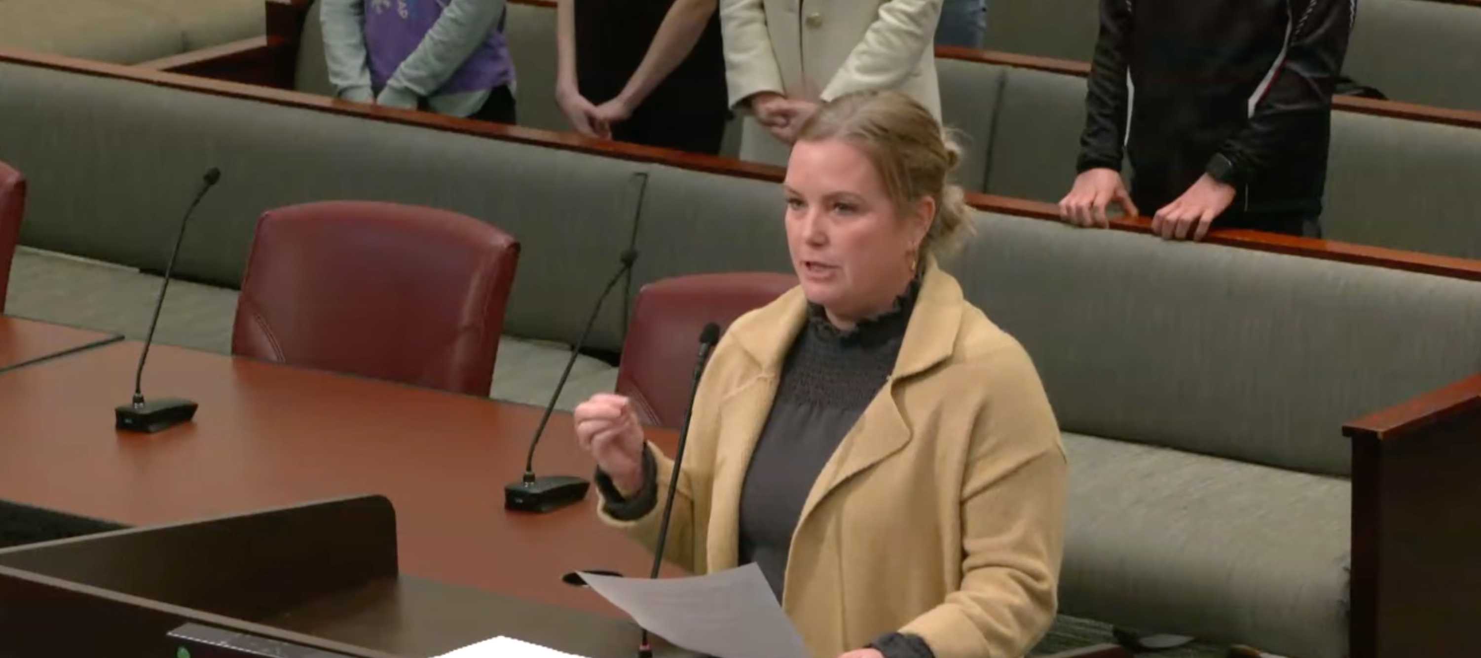 Erin Lester at podium